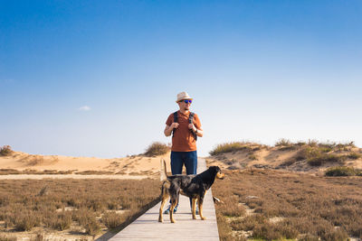 Full length of a dog standing on land