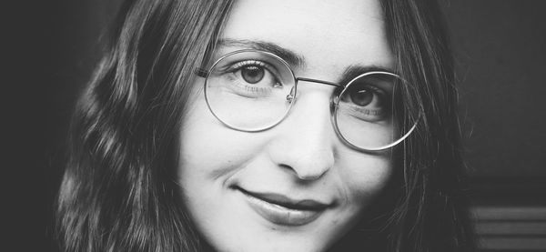 Close-up portrait of smiling woman