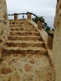 Low angle view of steps against sky