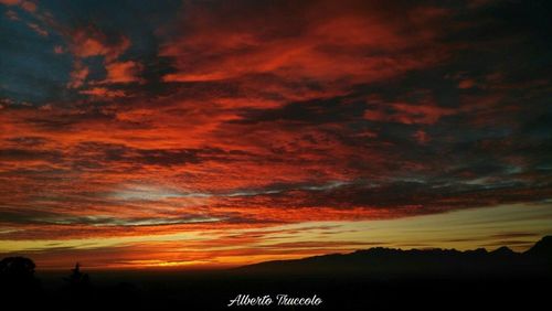 Scenic view of silhouette landscape against sky during sunset