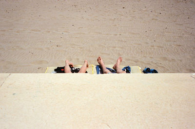 Low section of people on beach