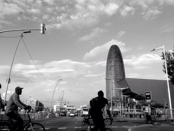 City street against cloudy sky