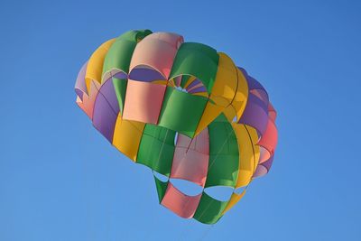 Colorful parachute with clear sky in the background