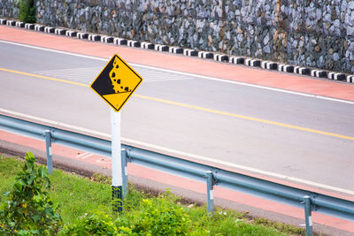 High angle view of road sign in city