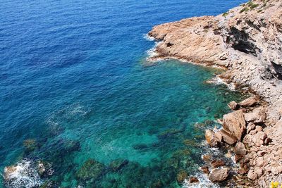 High angle view of rocks on beach