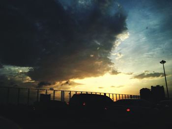 Low angle view of cloudy sky at sunset