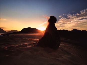 Scenic view of mountains at sunset