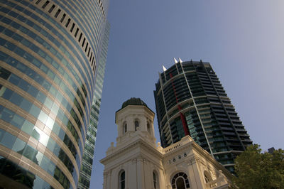 Low angle view of buildings against clear sky