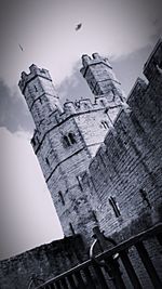 Low angle view of buildings in city against sky