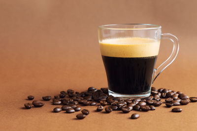 Close-up of coffee cup on table