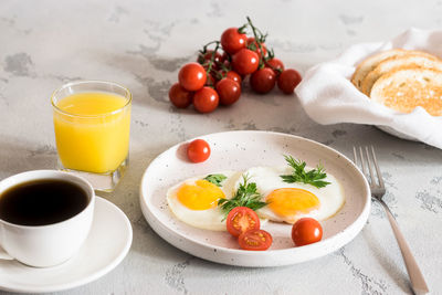 High angle view of breakfast served on table