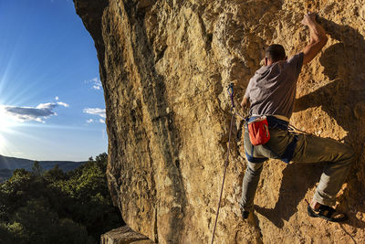 Shadow of man on rock