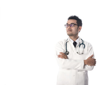 Full length of man standing against white background