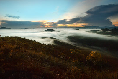 Scenic view of landscape against sky during sunset