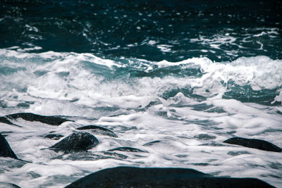 Waves splashing on shore