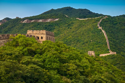 High angle view of trees and mountains against sky