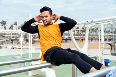 Man doing abdominal exercise at gym