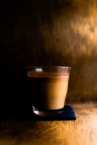 Close-up of coffee cup on table