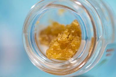 Close-up of cannabis wax in mason jar on table