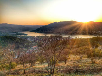 Scenic view of landscape against sky during sunset