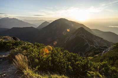 Scenic view of mountains against sky during sunset