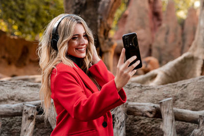 Young woman using mobile phone