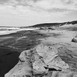 Scenic view of beach against sky