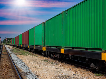 Train on railroad track against sky