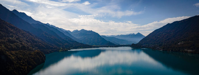 Panoramic view of lake and mountains against sky