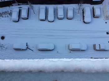 High angle view of snow covered wood