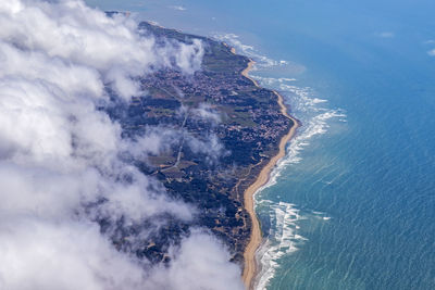 High angle view of island in sea against sky