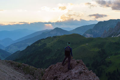 Hiking the trails of gardena pass, dolomites, italy