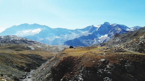 Scenic view of snowcapped mountains against sky