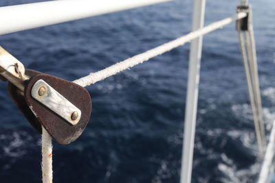 Close-up of rope in pulley on ship