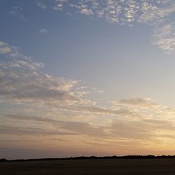 Scenic view of landscape at sunset