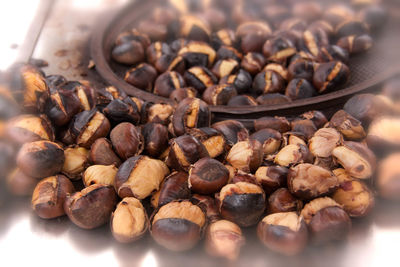 Close-up of coffee beans on table