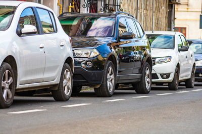 Cars parked on road