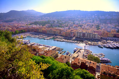 High angle view of river amidst buildings in city