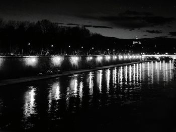 Reflection of illuminated buildings in water