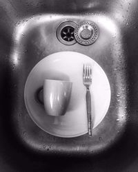 Close-up of electric lamp on plate