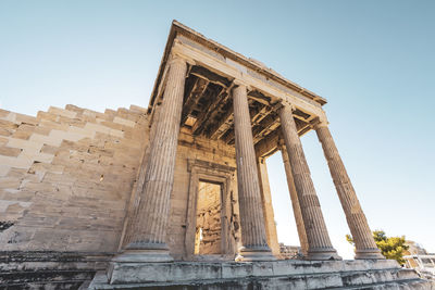 Low angle view of old ruins against clear sky