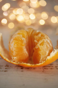 Close-up of orange slice on table