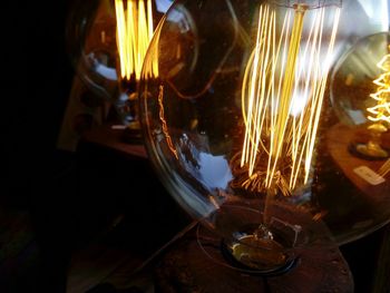 Close-up of illuminated electric lamp