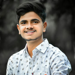 Portrait of young man smiling