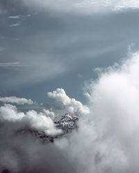 Low angle view of airplane flying in sky