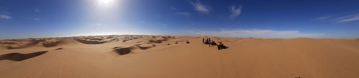 Panoramic view of desert against sky