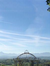 Traditional windmill against blue sky