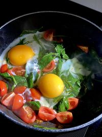 High angle view of vegetables in pan