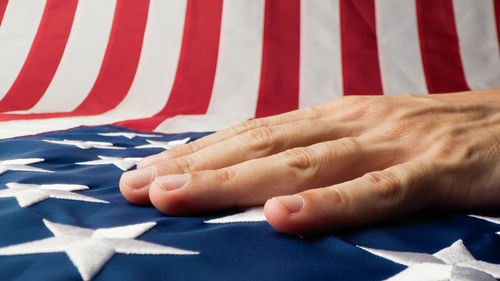 Cropped hand of person holding paper