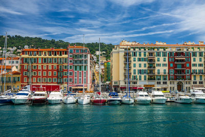 Boats in sea against sky